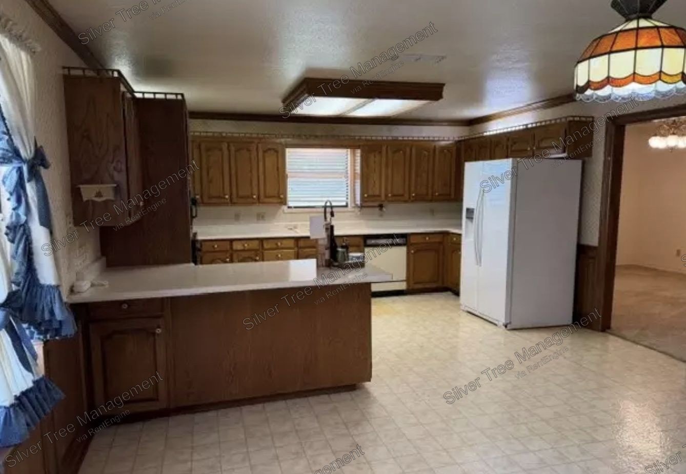 Ask About Our No Security Deposit Option! Spacious 4 Bedroom, 3.5 Bath Home with Cozy Fireplace and Classic Charm. property image