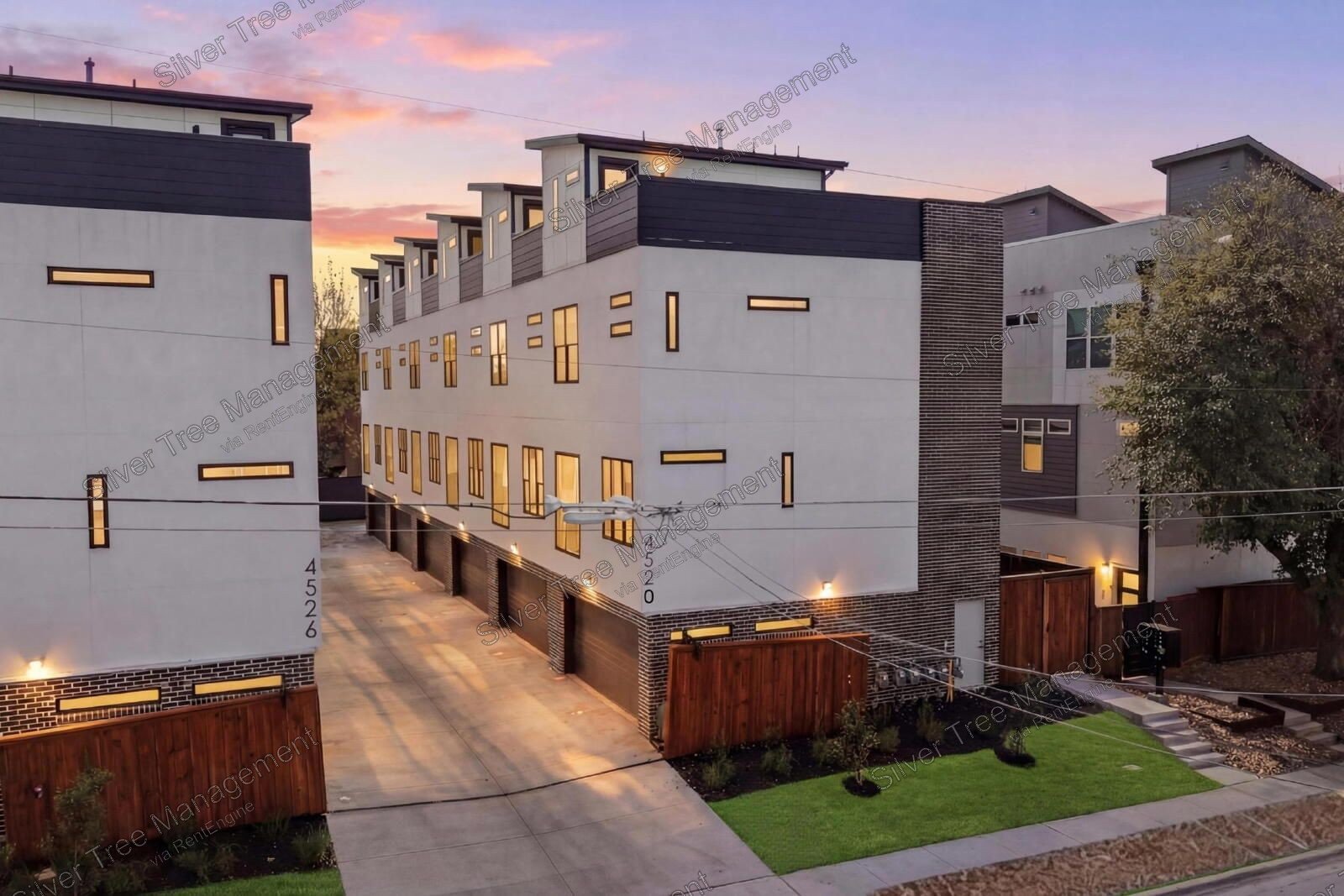 Welcome to this brand-new modern townhome located in a gated Dallas community! property image