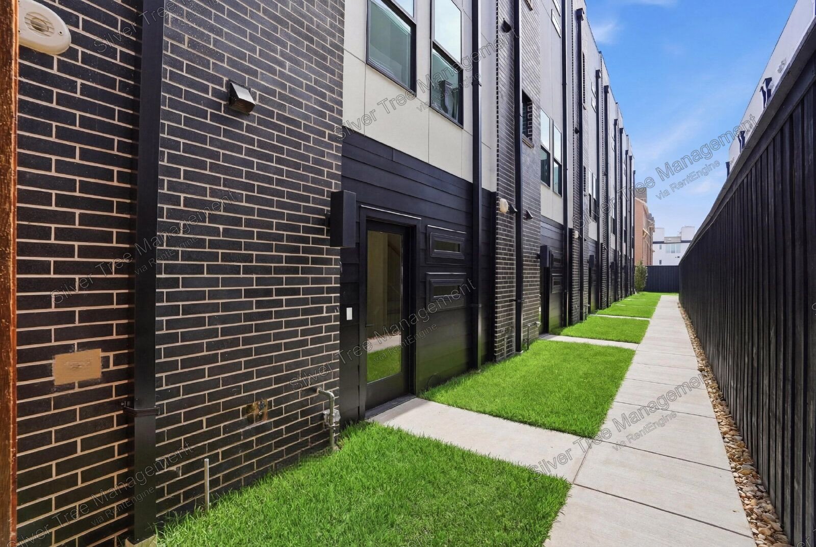 Welcome to this brand-new modern townhome located in a gated Dallas community! property image
