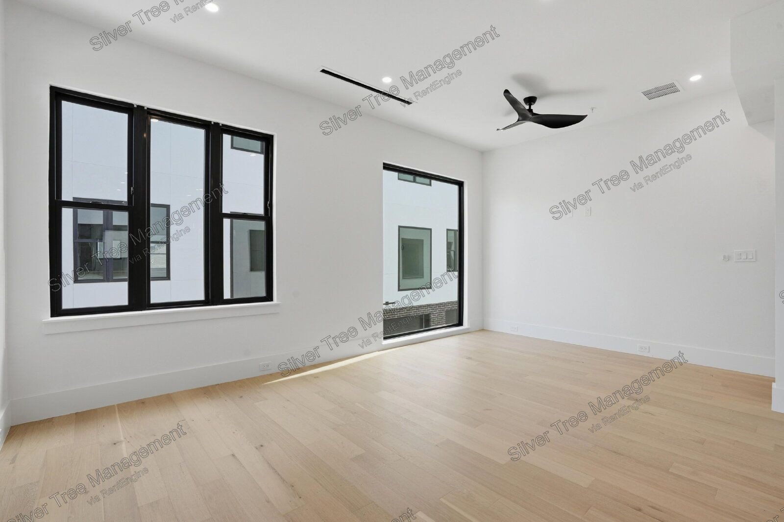 Welcome to this brand-new modern townhome located in a gated Dallas community! property image