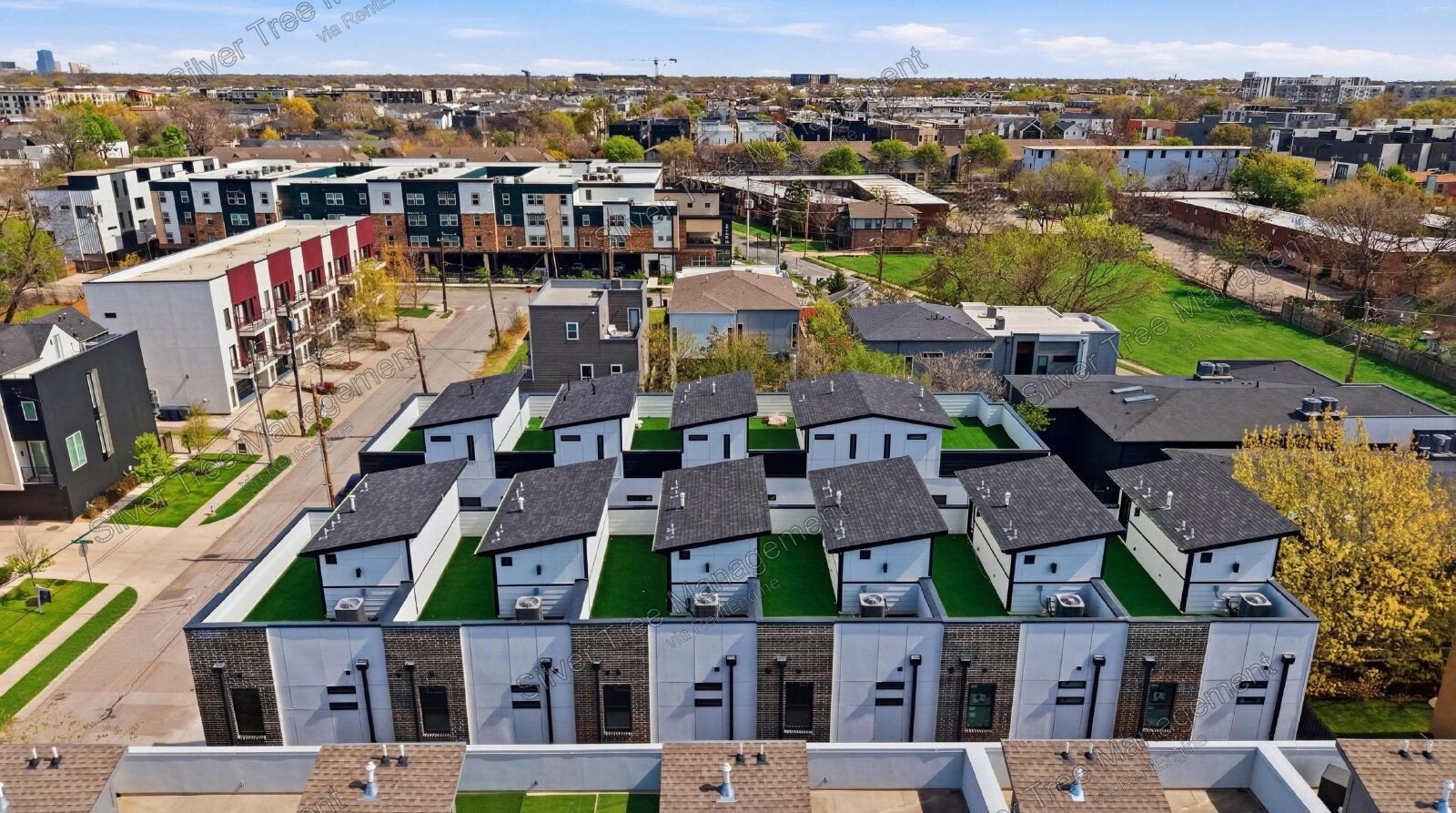 Welcome to this brand-new modern townhome located in a gated Dallas community! property image